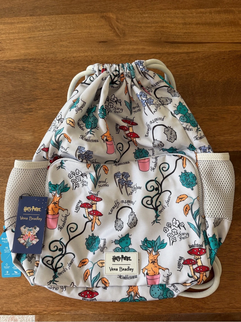 Vera Bradley Drawstring Backpack in White, Teal & Orange Harry Potter Print